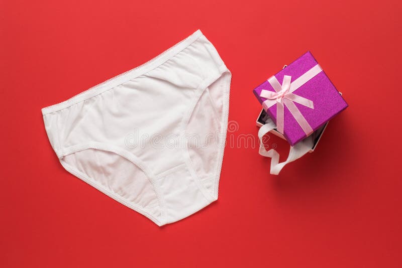 https://thumbs.dreamstime.com/b/white-women-s-underwear-gift-box-red-background-surprise-flat-lay-white-women-s-underwear-gift-box-red-219977591.jpg