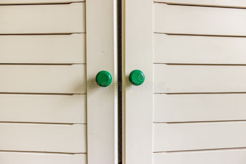 White Wooden Background with Green Handles Stock Photo - Image of