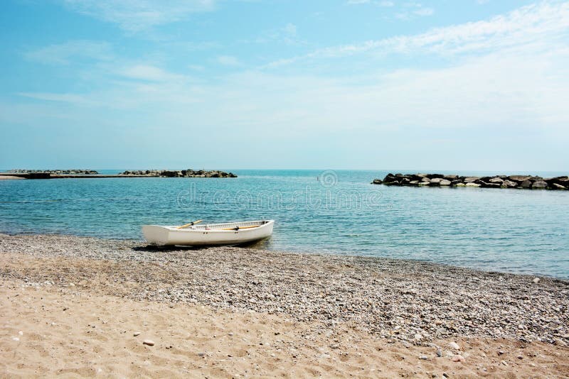 White wooden boat at Kew-Balmy Beach