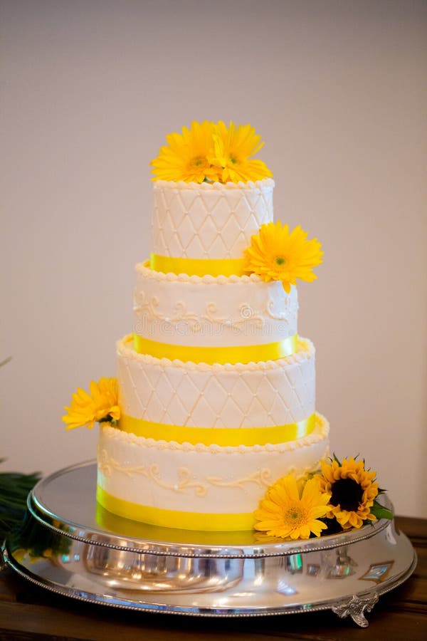 White and Yellow Wedding Reception Cake stock photo White and Yellow Wedding Reception Cake stock photo