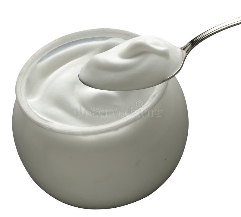 Yogurt bianco con un cucchiaino.