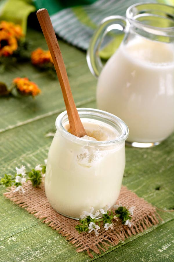 White yogurt in glass jar stock photo. Image of bowl - 57593440