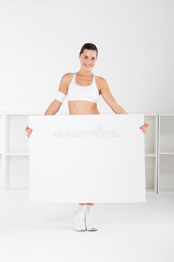 Whiteboard de fixation de femme de gymnastique image libre de droits Whiteboard de fixation de femme de gymnastique image libre de droits