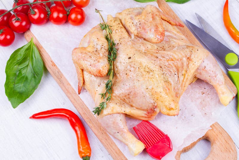 Prepared Chicken On Cooking Paper Stock Photo, Picture and Royalty Free  Image. Image 74446563.