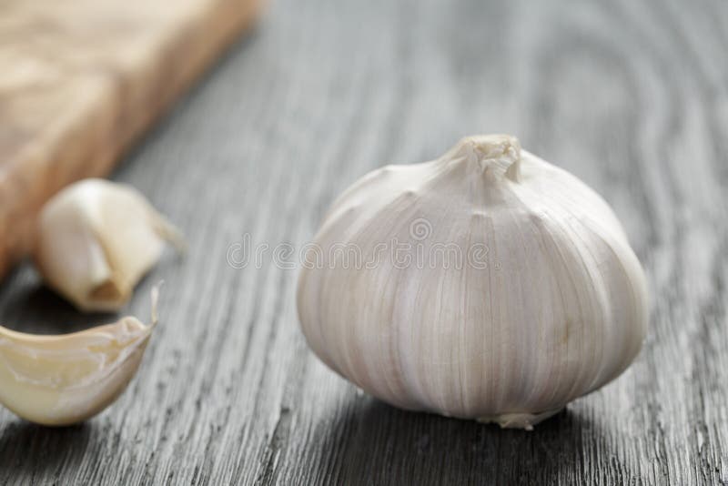 Whole Garlic Head on Oak Wood Table Stock Image Image of ingredient