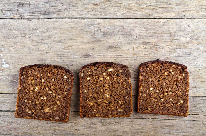 Whole grain brown bread. stock image. Image of background 97143419