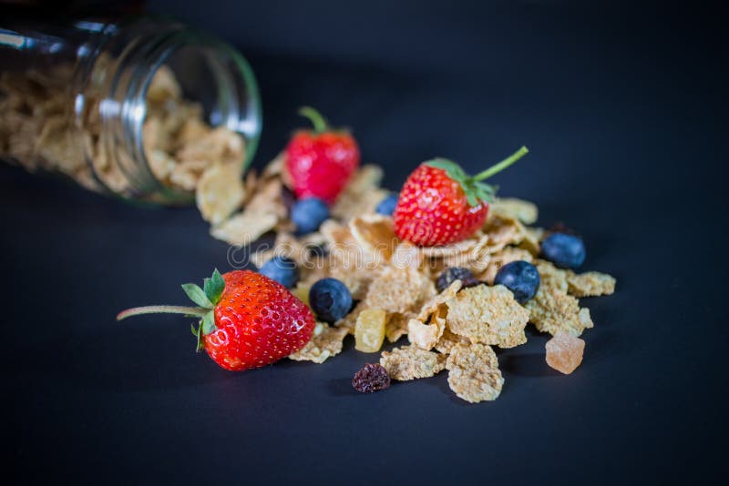 Whole Grain Cereal Flakes Which Mixed Berry Fruit and Raisins Stock