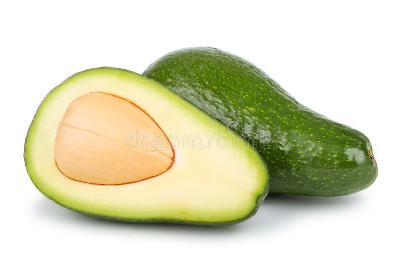 Whole and half avocado royalty free stock photography