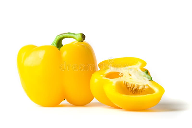 Whole and half yellow bell pepper