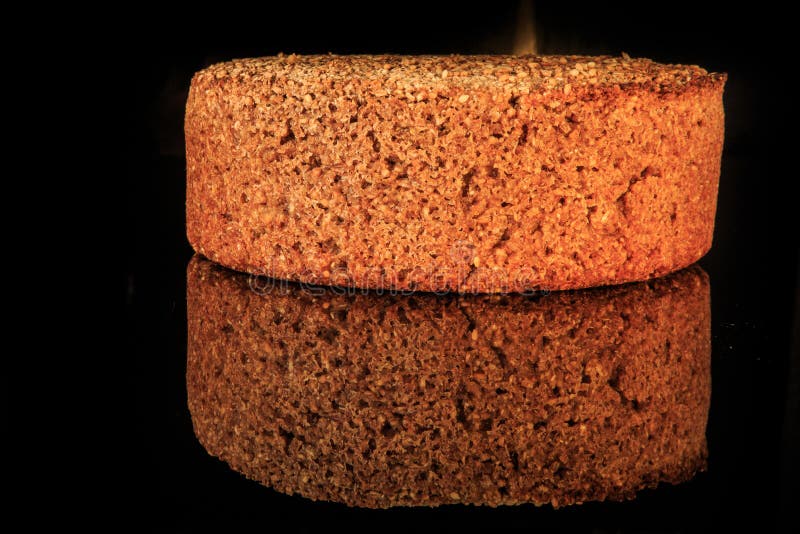Whole loaf of round rye bread with sesame seeds freshly baked at home royalty free stock images Whole loaf of round rye bread with sesame seeds freshly baked at home royalty free stock images