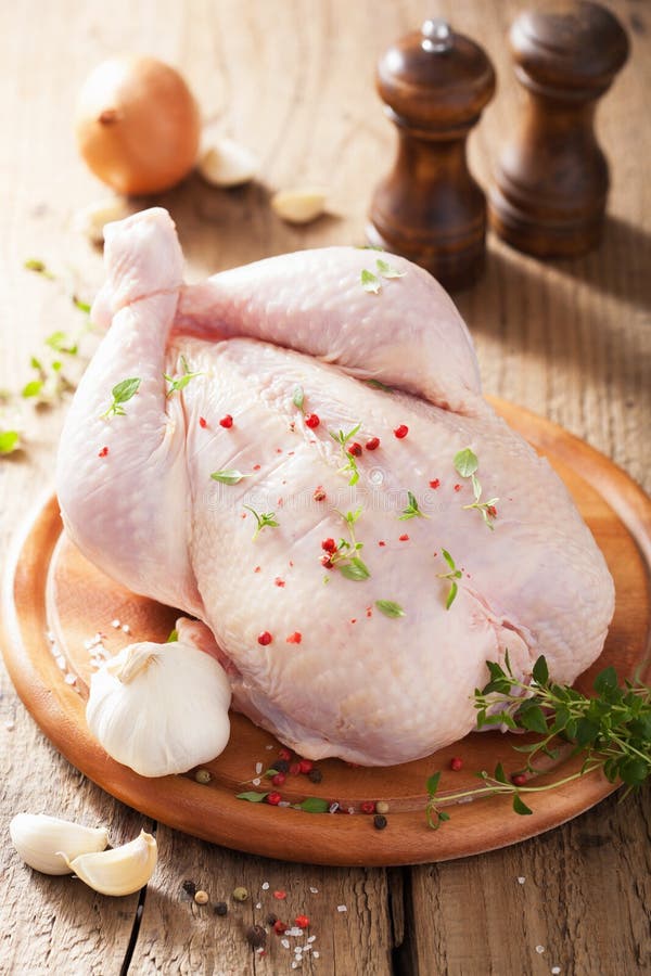 Whole Raw Chicken with Rose Pepper and Thyme Stock Image Image of