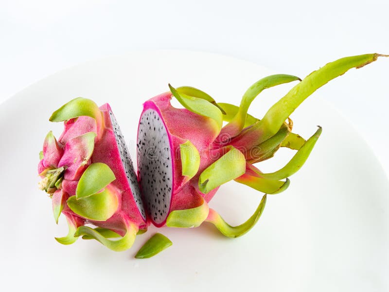 Whole Red Dragon Fruits Cut in Half Isolated on White Background, Flesh