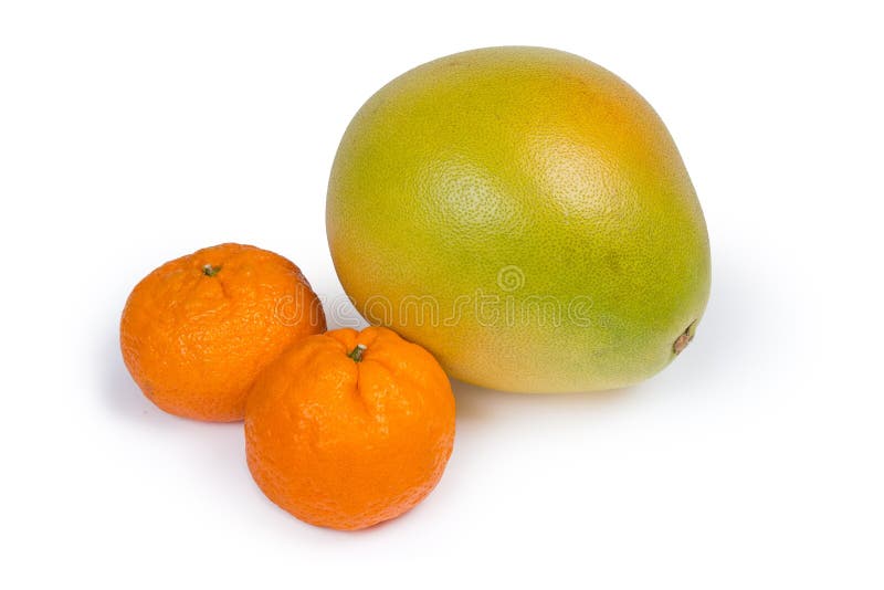 Mandarin Oranges with Twigs and Leaves on Old Wooden Surface Stock