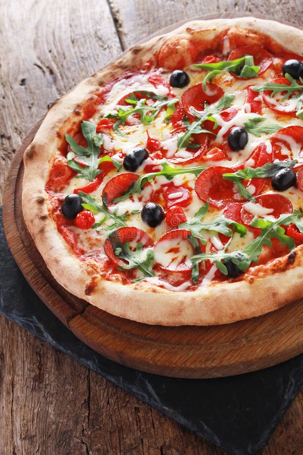 Whole salami pizza stock photo. Image of traditional 63564548