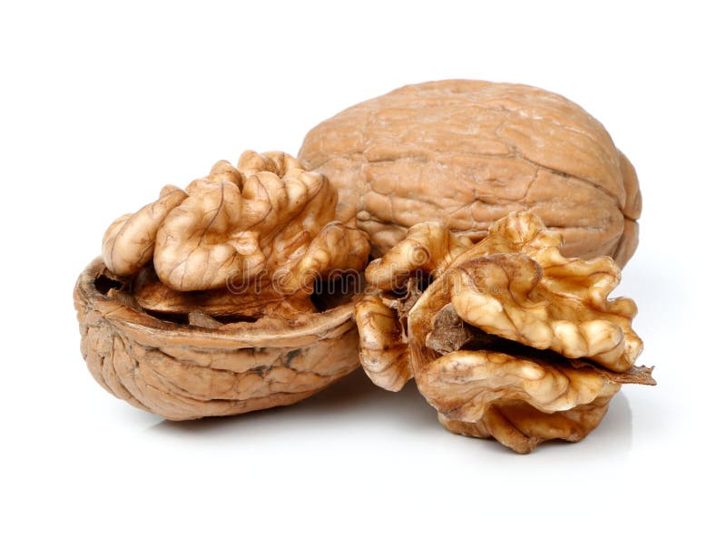 Whole Walnut and Half Walnut Piece. Stock Photo Image of background