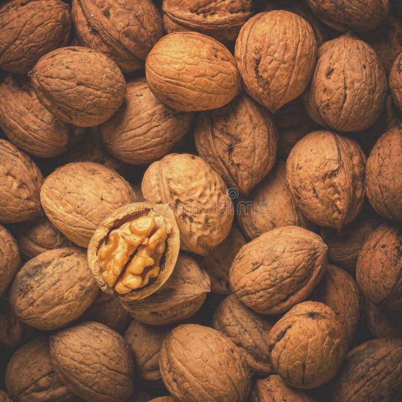 Whole Walnuts and Half the Kernel, Food Concept. Top View Stock Photo