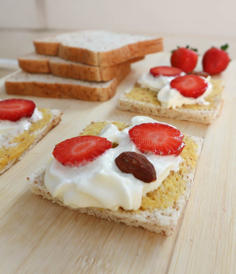 Whole wheat bread and canape with strawberry royalty free stock photo Whole wheat bread and canape with strawberry royalty free stock photo