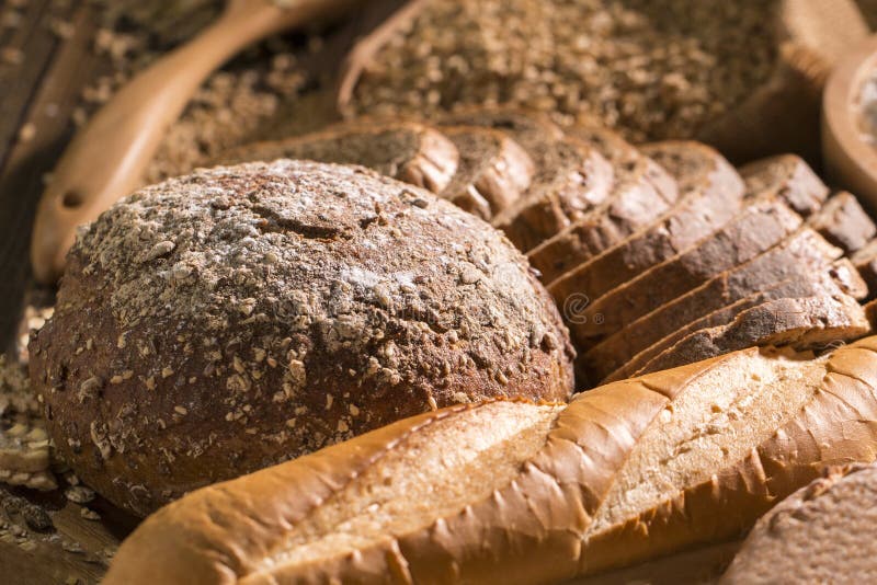 Whole Wheat Bread and Eggs on Wood Table. Stock Photo Image of