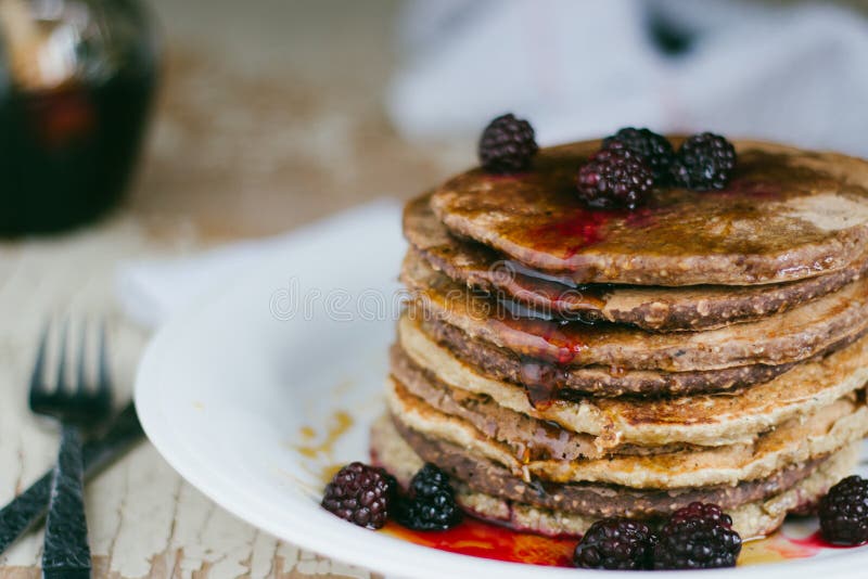 Whole Wheat Oatmeal Pancakes with Blackberry and Syrup Stock Image