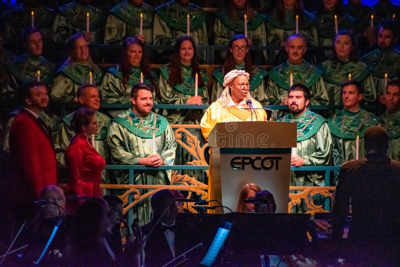 Orlando, Florida.  December 06, 2019. Whoopi Goldberg telling the touching story of Christmas, accompanied by orchestra and heavenly choir in Candlelight Narrators at Epcot 1 38. Orlando, Florida.  December 06, 2019. Whoopi Goldberg telling the touching story of Christmas, accompanied by orchestra and heavenly choir in Candlelight Narrators at Epcot 1 38