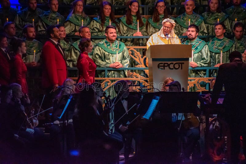 Orlando, Florida.  December 06, 2019. Whoopi Goldberg telling the touching story of Christmas, accompanied by orchestra and heavenly choir in Candlelight Narrators at Epcot 1 34. Orlando, Florida.  December 06, 2019. Whoopi Goldberg telling the touching story of Christmas, accompanied by orchestra and heavenly choir in Candlelight Narrators at Epcot 1 34