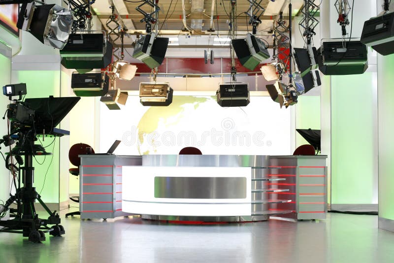 Television studio interior with news desk, camera prompter and professional lightning. Television studio interior with news desk, camera prompter and professional lightning