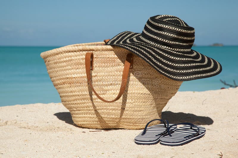 Bag, Hat And Flip-flops On The Beach Stock Image - Image of white ...