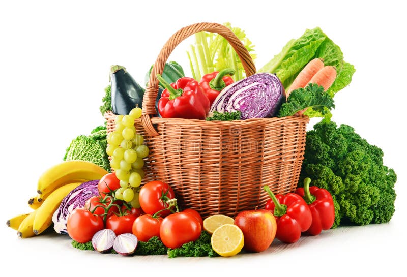 Wicker basket with assorted organic vegetables and fruits