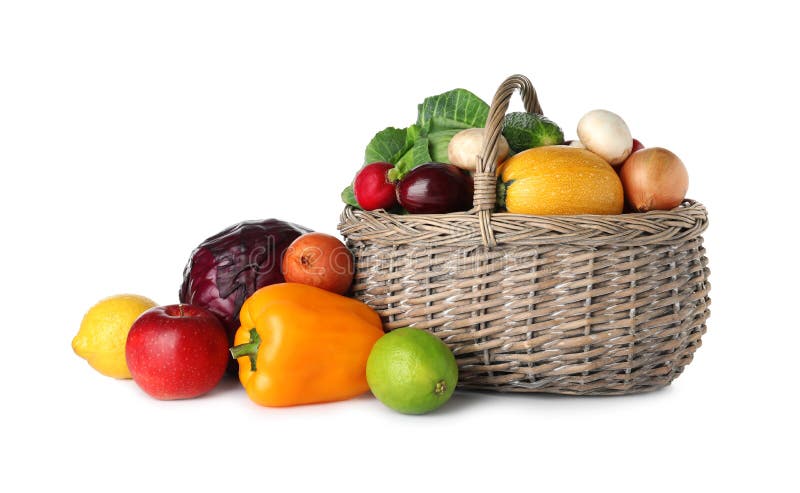 Wicker basket with fresh fruits and vegetables on white