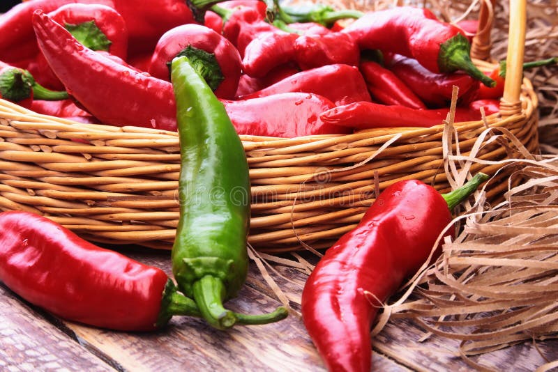 Wicker basket full of fresh red chili peppers. royalty free stock images Wicker basket full of fresh red chili peppers. royalty free stock images