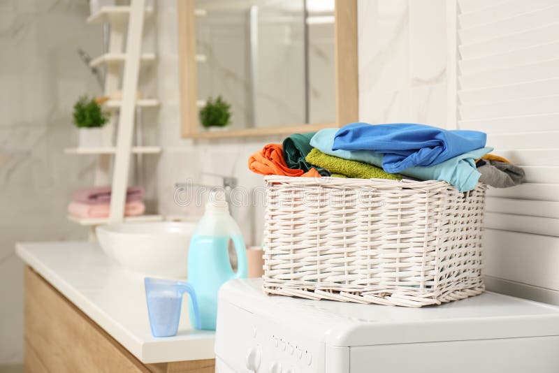 Wicker Basket with Laundry on Washing Machine Stock Image Image of