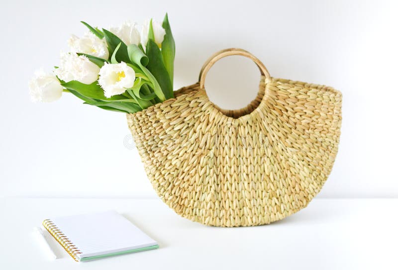 Wicker Handbag with Flowers Tulips, Spring Time, Summer Concept