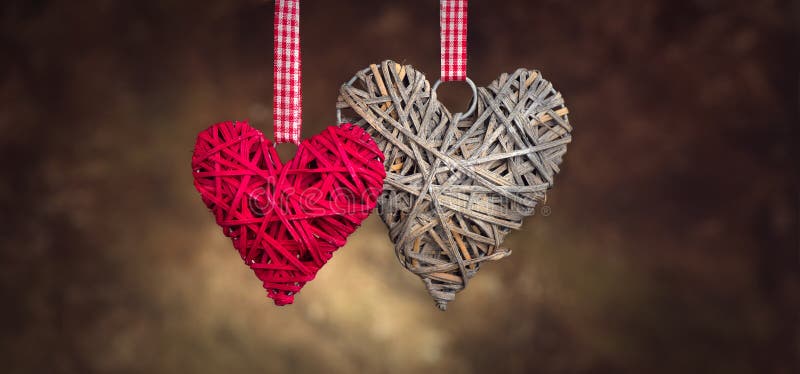 Wicker hearts made of straw, Vintage styled St. Valentine`s Day art design. Beautiful Valentine card design.