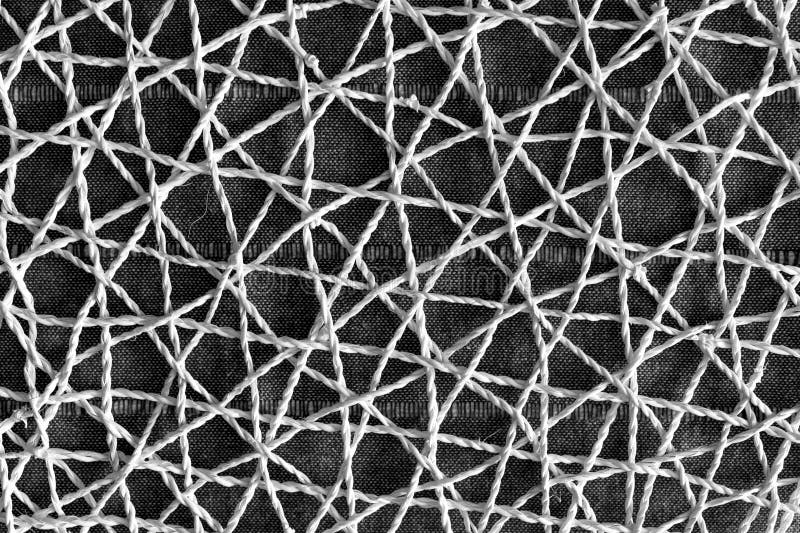 Wicker mesh texture background. Black and white stock photo
