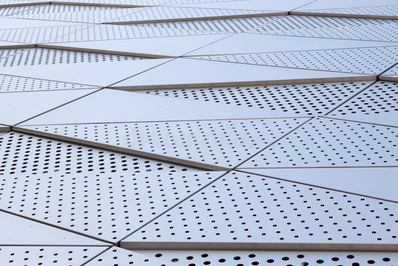 Wide Angle View of Building Wall with Triangular Pattern and Round ...