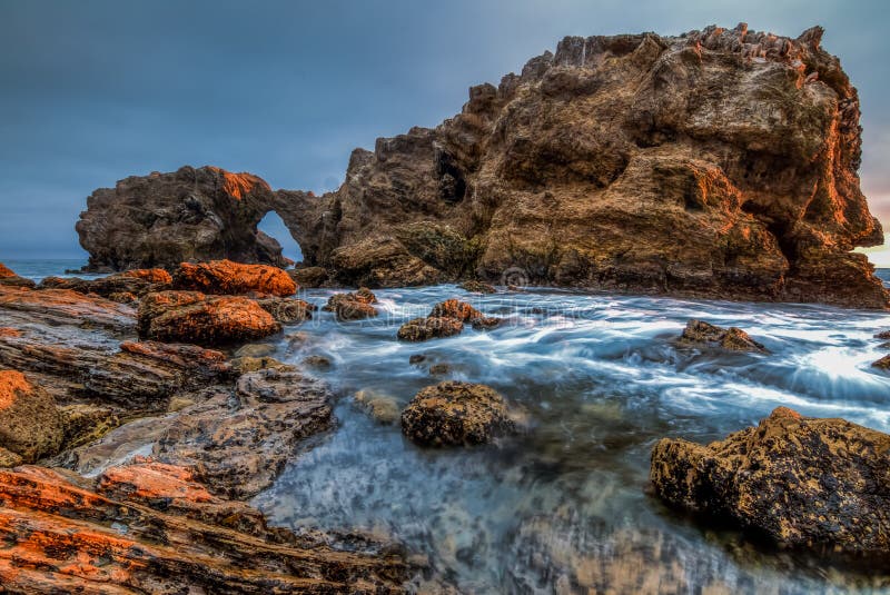 Lacy Foam and Jagged Rocks - Corona Del Mar Beach in Orange County