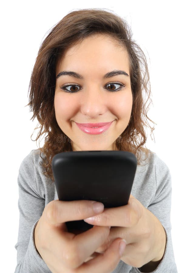 Wide angle view of a pretty teenager girl happy with a smart phone royalty free stock image Wide angle view of a pretty teenager girl happy with a smart phone royalty free stock image