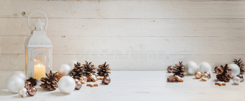 Wide christmas background with a candle light lantern, baubles, royalty free stock photo Wide christmas background with a candle light lantern, baubles, royalty free stock photo
