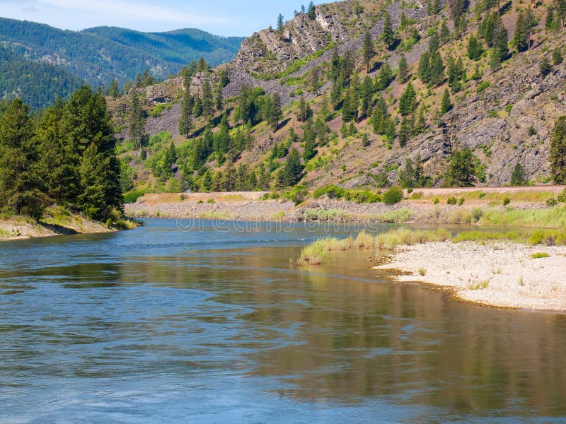 Wide Mountain River Cuts a Valley Clark Fork River Stock Photo