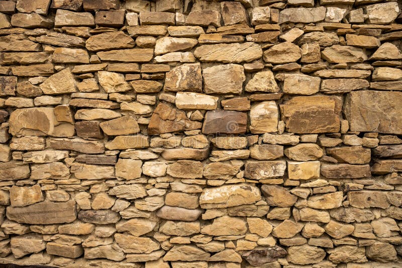 Wide Shot of Stacked Stone Wall with Beige Rocks Stock Photo Image of