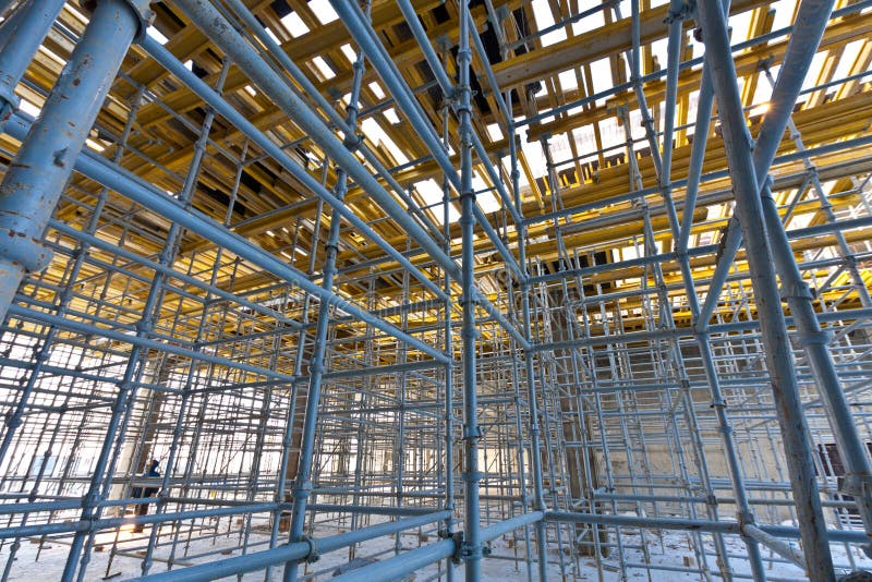 Wide view metalic scaffolding inside building