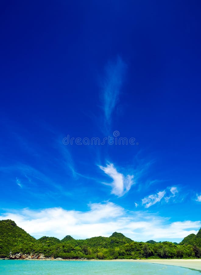 Wide view of sea and the mountain with blue sky