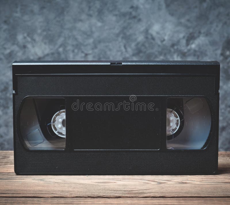 Wideo kasety zakończenie na drewnianej półce zdjęcia royalty free Wideo kasety zakończenie na drewnianej półce zdjęcia royalty free
