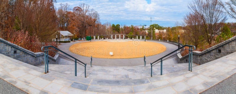 Panoramic view of oval lawn and Grand Arbor from stairs in the Piedmont Park in autumn day, Atlanta, USA. Panoramic view of oval lawn and Grand Arbor from stairs in the Piedmont Park in autumn day, Atlanta, USA