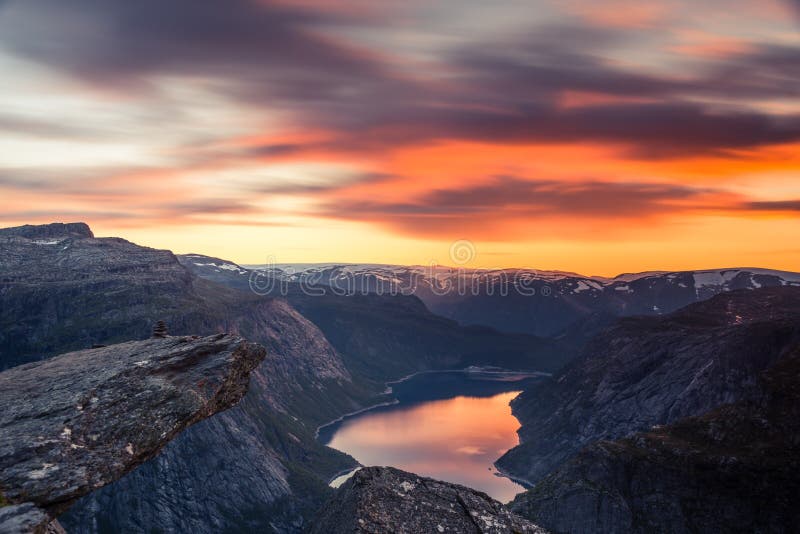 02/09-17, Trolltunga, Norway.  View from the General area of Trolltunga during a sunset. Lake Ringedalsvatnet is reflecting the beautiful sky. The lake is the main reservoir for the hydroelectric power station in Tyssedal. 02/09-17, Trolltunga, Norway.  View from the General area of Trolltunga during a sunset. Lake Ringedalsvatnet is reflecting the beautiful sky. The lake is the main reservoir for the hydroelectric power station in Tyssedal