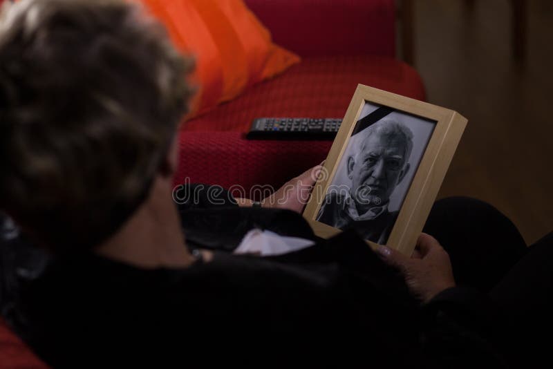 Widow mourning dead person stock photos