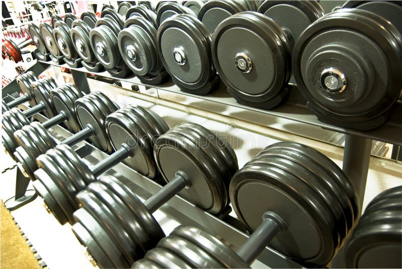 Weights, dumbells in the gym. Weights, dumbells in the gym