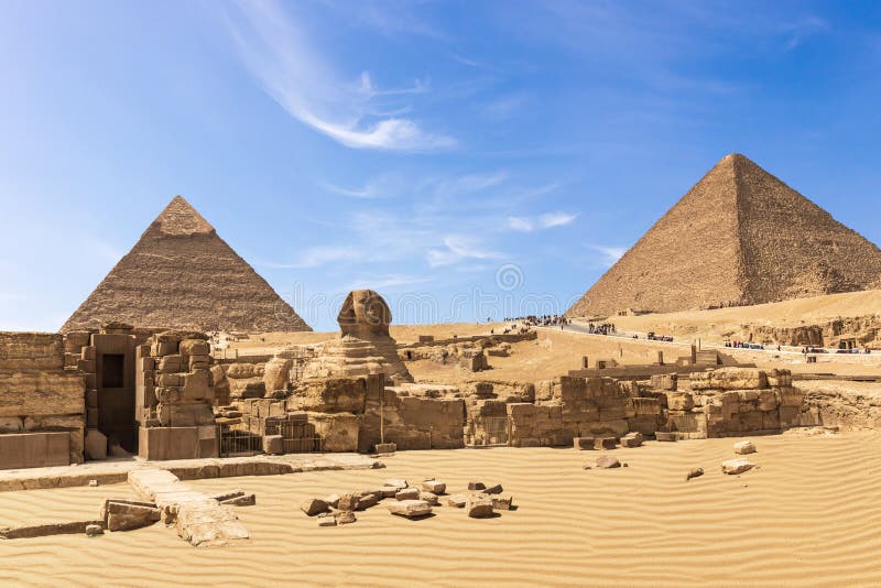 Wielcy ostrosłupy Giza kompleks: sfinks ostrosłup Chephren świątynia i ostrosłup Cheops, Egipt zdjęcie stock Wielcy ostrosłupy Giza kompleks: sfinks ostrosłup Chephren świątynia i ostrosłup Cheops, Egipt zdjęcie stock