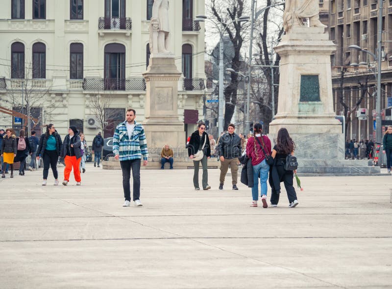 Bucharest, Romania - 02.25.2023: Many people and tourists at University Square in the center of Bucharest. Bucharest, Romania - 02.25.2023: Many people and tourists at University Square in the center of Bucharest