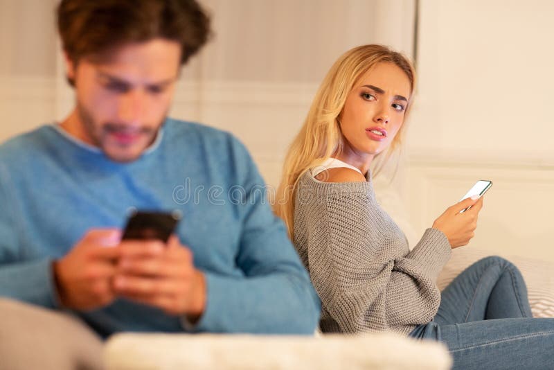 Wife Catching Cheating Husband Texting with Another Woman at Home Stock  Image - Image of boyfriend, couple: 163642453